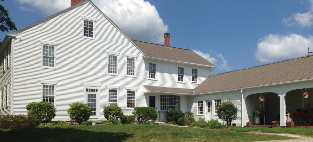 Large colonial farmhouse exterior renovation