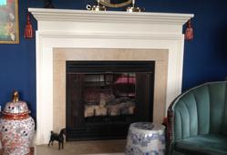Traditional fireplace restoration with white mantel